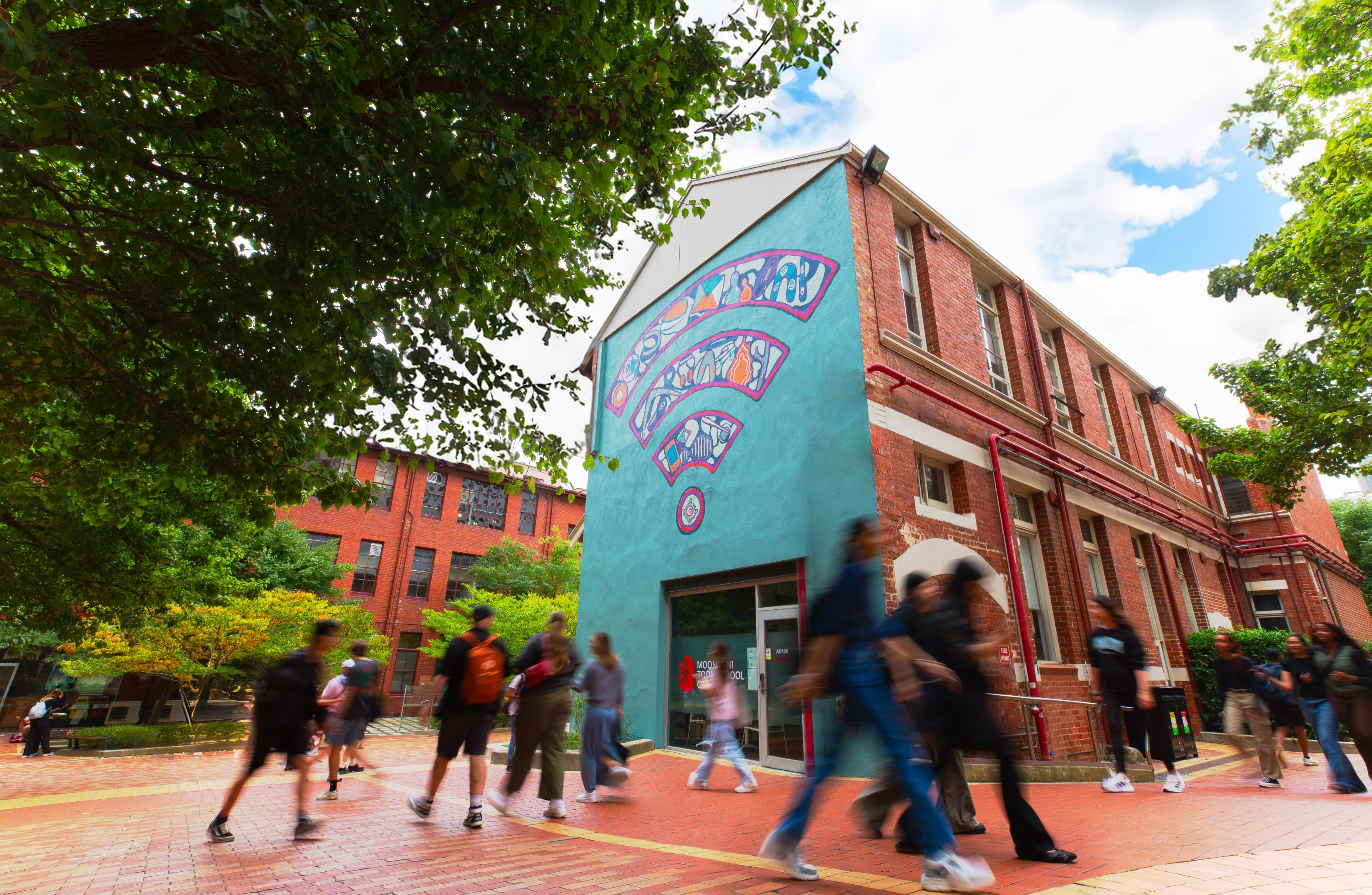 The exterior of the Moondani Toombadool Centre building on Swinburne's Hawthorn campus featuring mural by artist Mandi Barton The exterior of the Moondani Toombadool Centre building on Swinburne's Hawthorn campus featuring mural by artist Mandi Barton