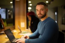 A student using a laptop in StudentHQ