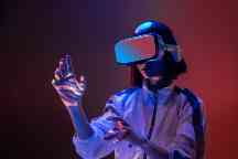 A woman wearing Virtual Reality glasses