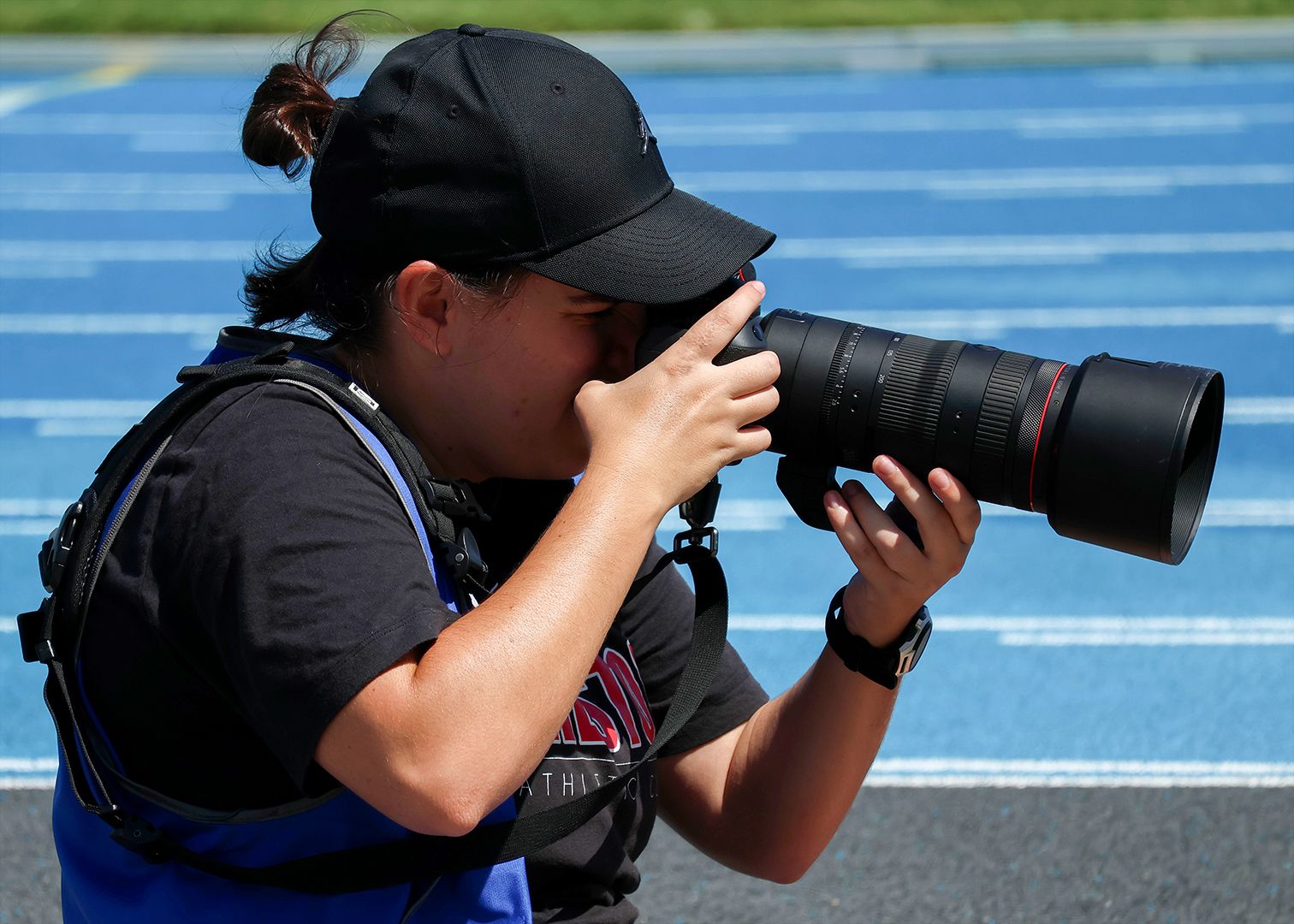 Joanna Margiolis Swinburne design alum Swinburne design alum Joanna Margiolis taking photos at her local athletics club