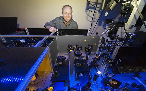 Jeff Davis behind his optical table 