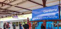 People getting on the train at Glenferrie Station.