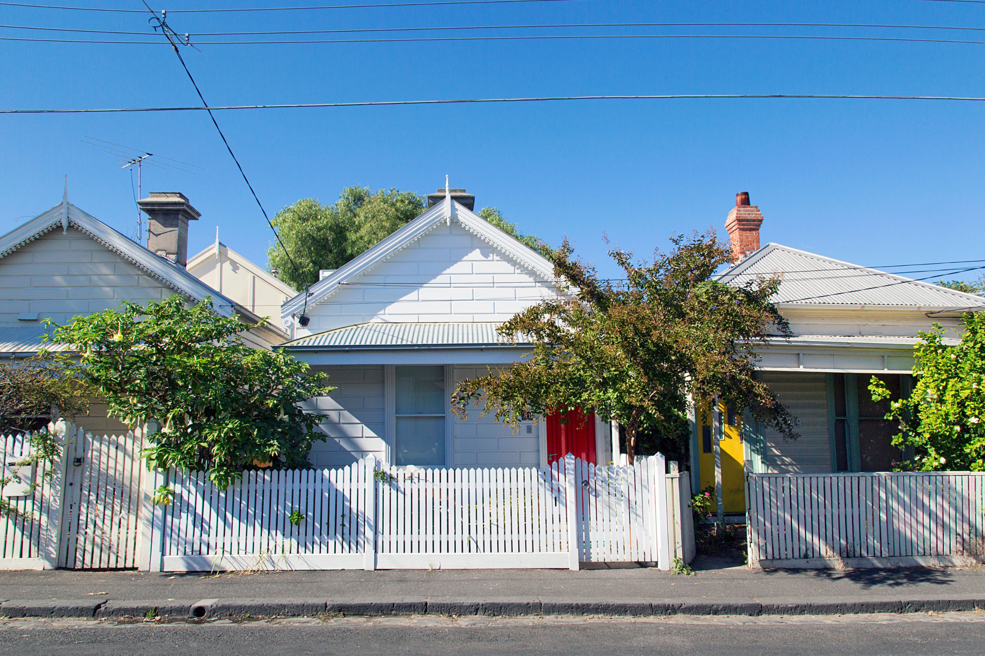 Charming bungalow homes Charming bungalow homes with white picket fence.