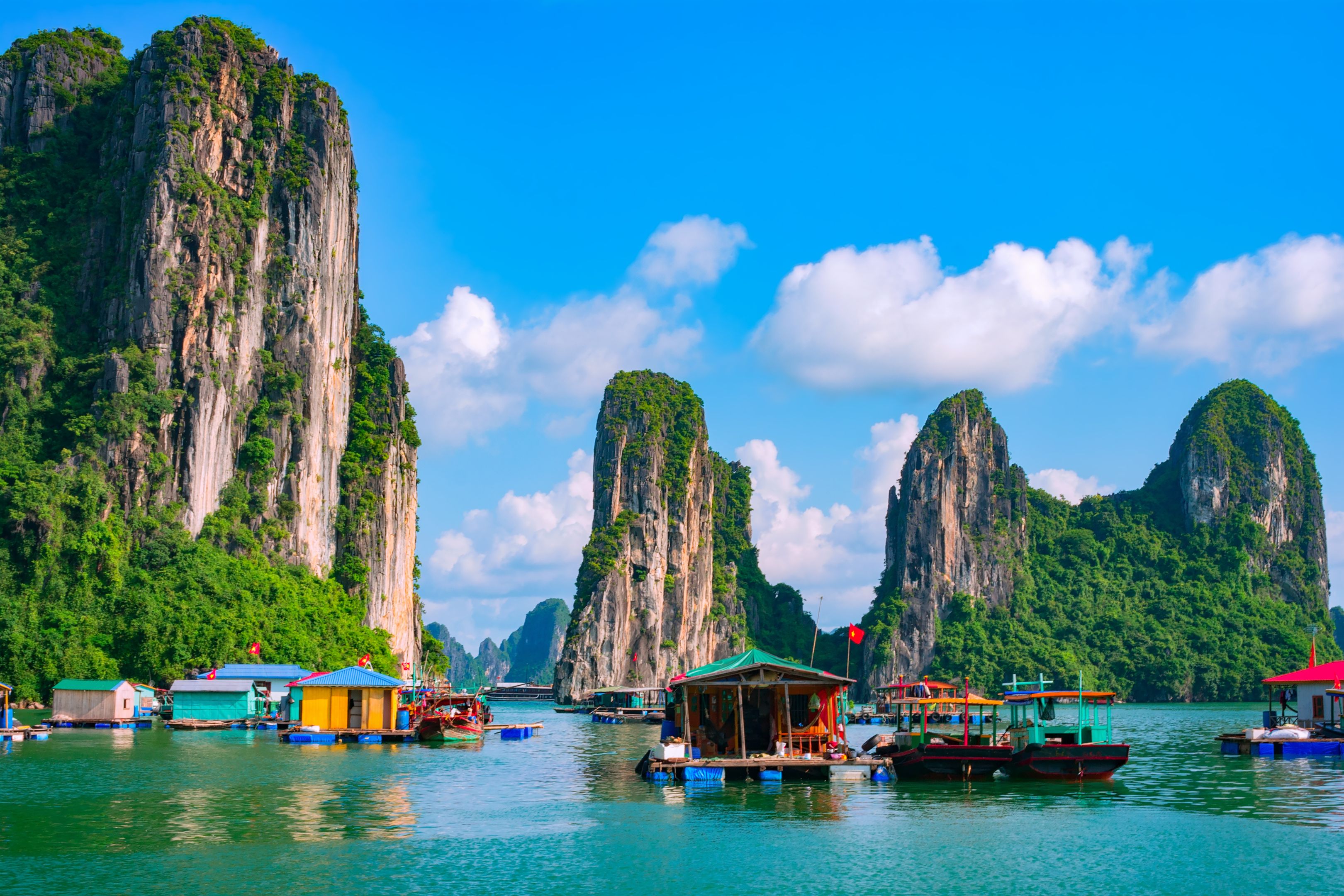 Floating village Halong Bay, Vietnam Floating village, rock island, Halong Bay, Vietnam