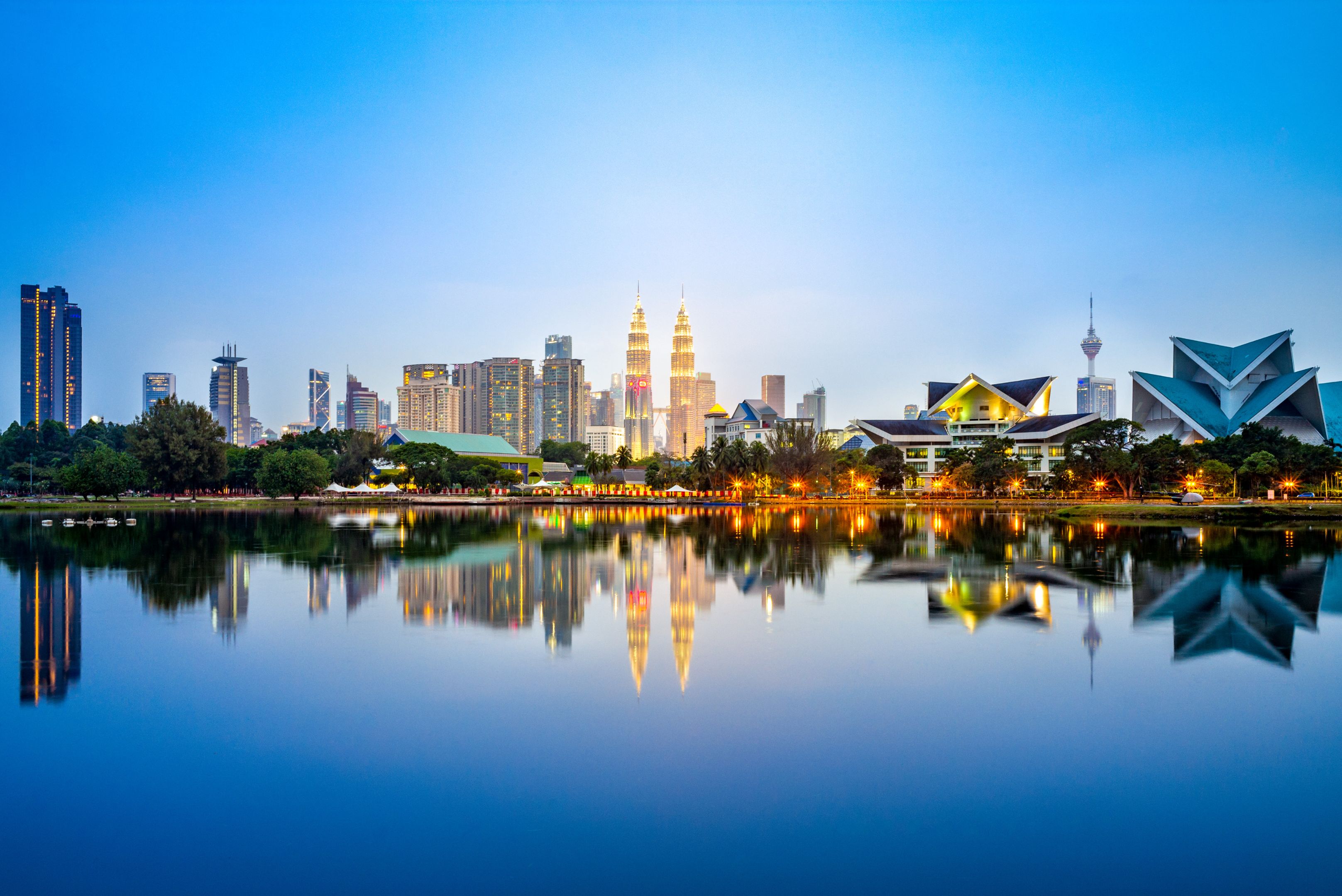 Skyline of Kuala Lumpur by the lake Dusk skyline by the lake of Titiwangsa in Kuala Lumpur, Malaysia