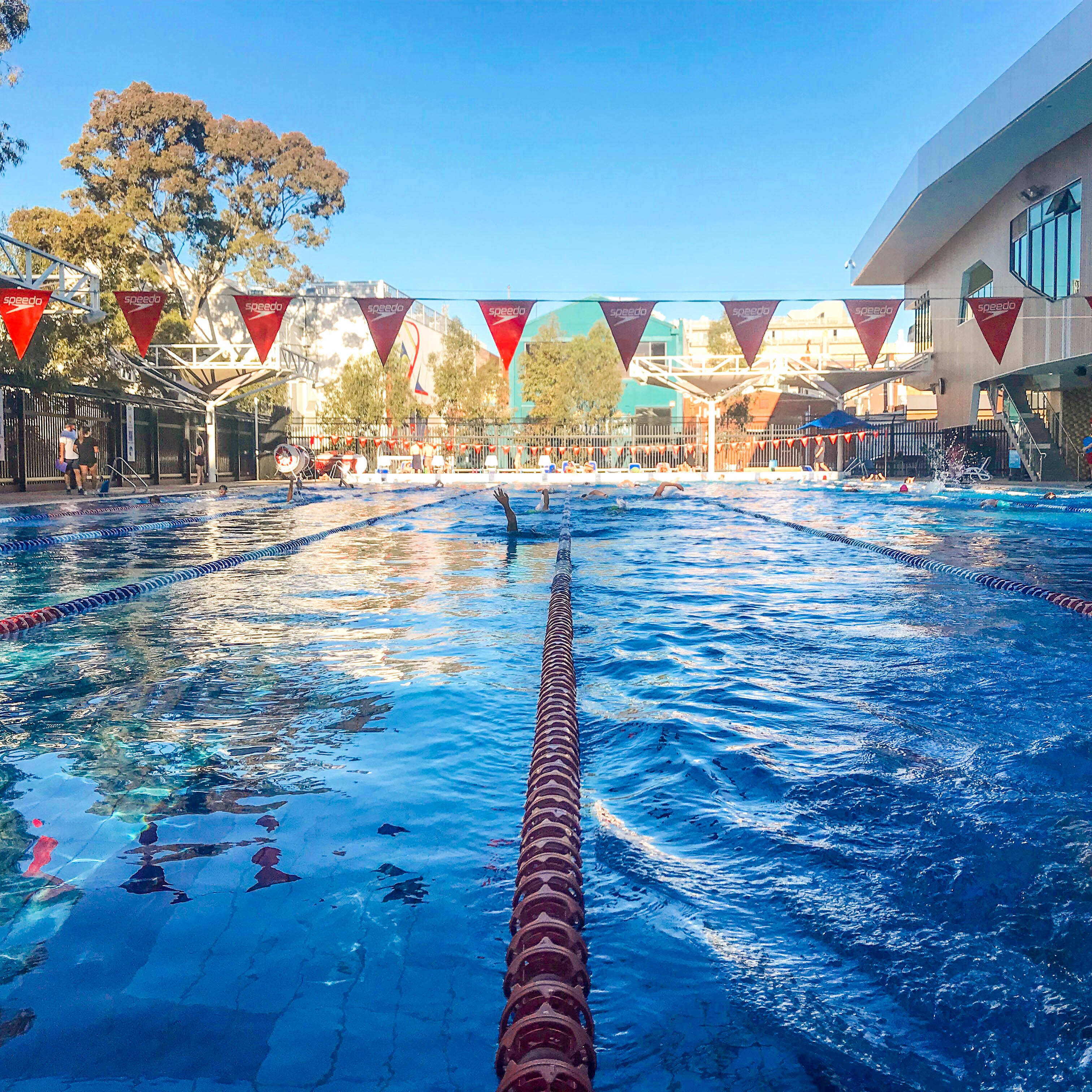 Hawthorn Aquatic and Leisure Centre Students swimming in outdoor open air swimming pool