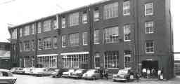 Students and their cars in front of the Art School, 1962.