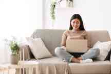 Girl browsing online on laptop