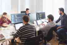 Game developing team working in the office