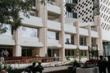 Students walking by the new architecturally designed Latelab building