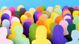 Lots of multicolored men and women silhouettes made with paper for crowd concept