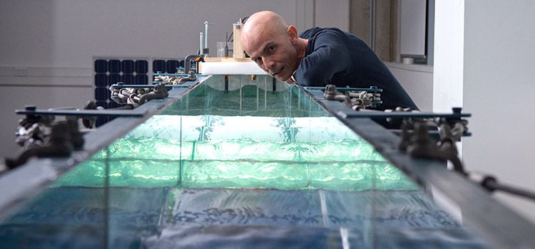 Professor Richard Manasseh uses the wave-maker.