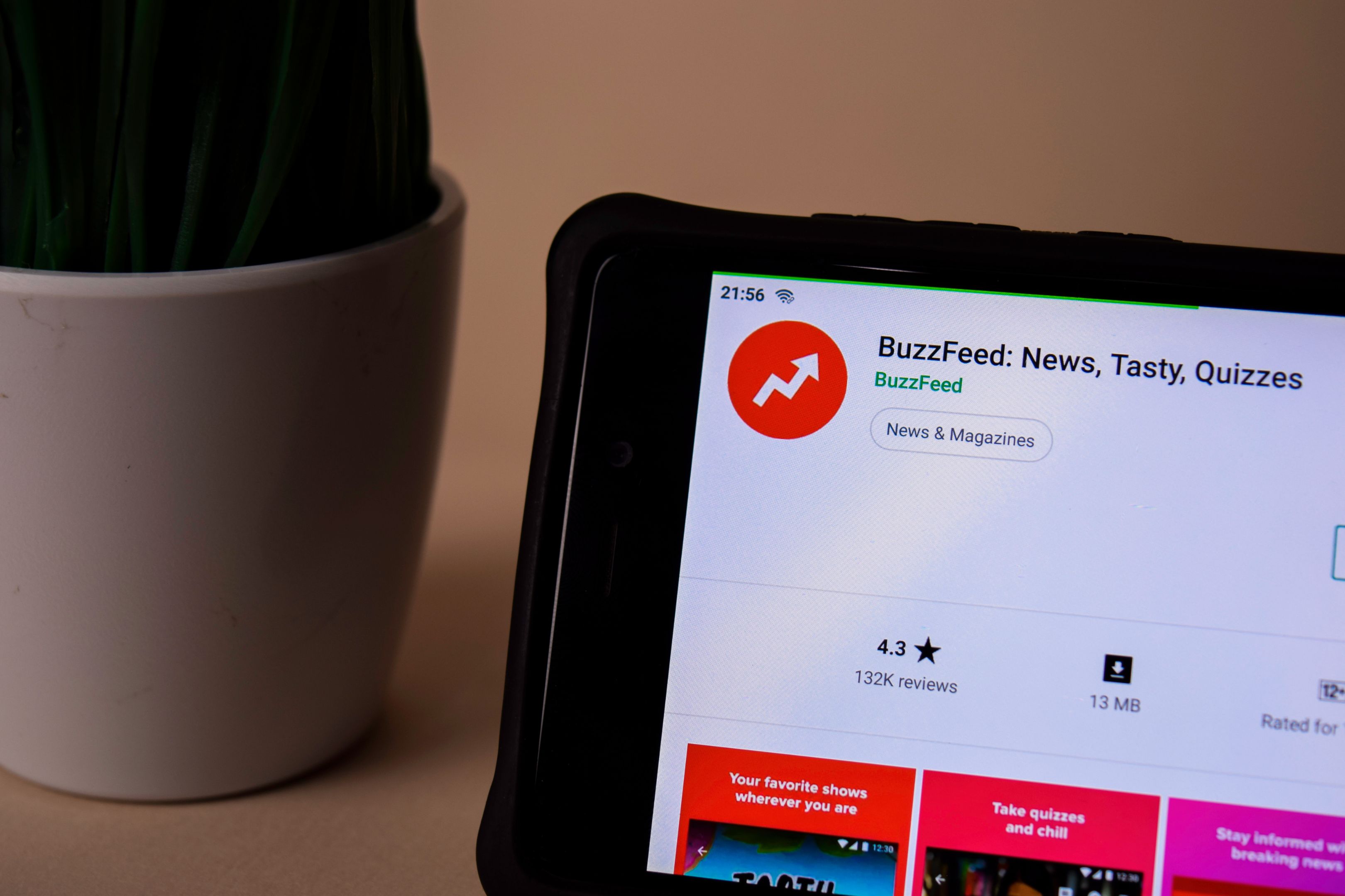 Buzzfeed Buzzfeed shown on the app store on a device