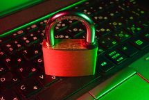 padlock on top of laptop keyboard