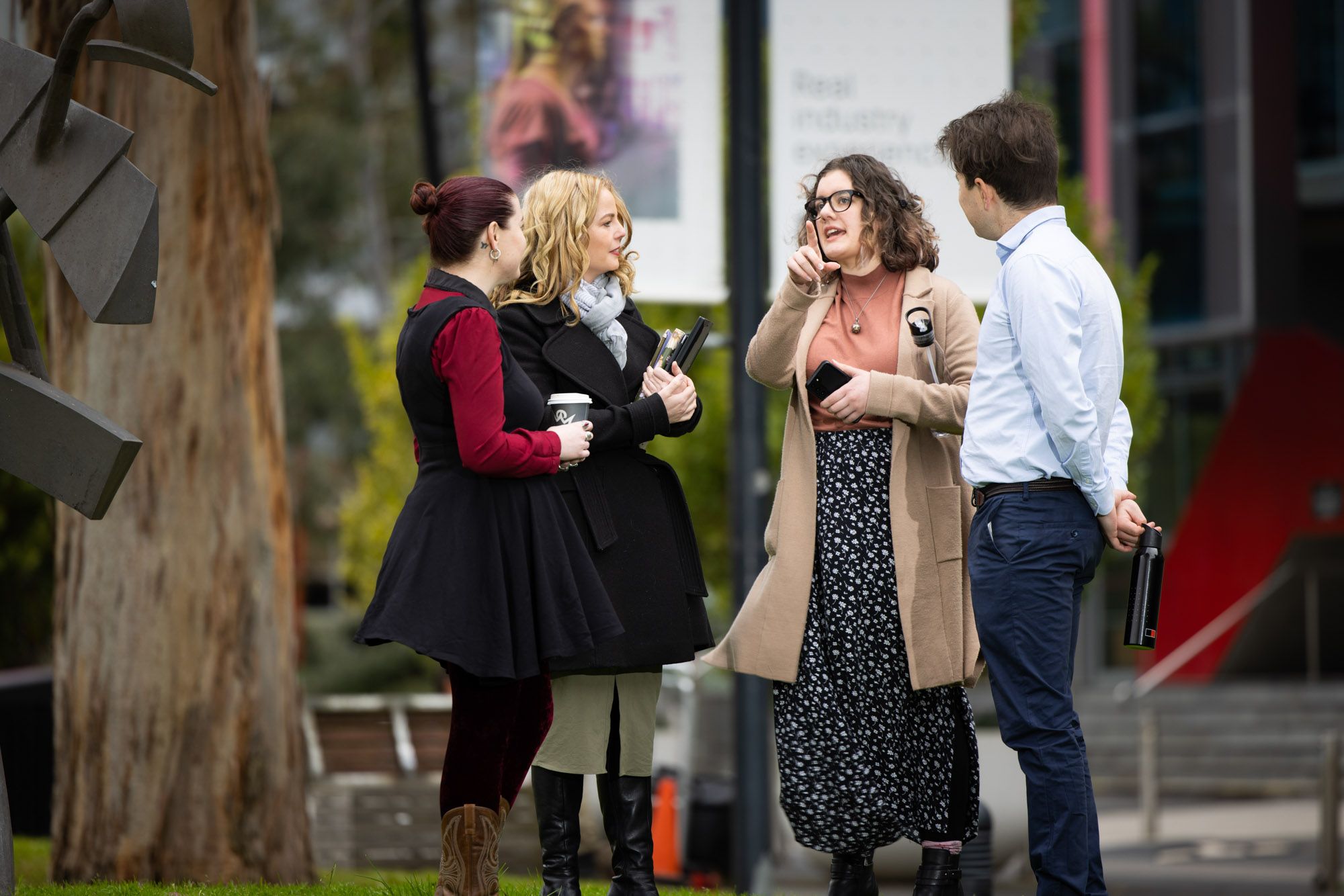 group-of-workers-talking.jpg 4 people having a conversation