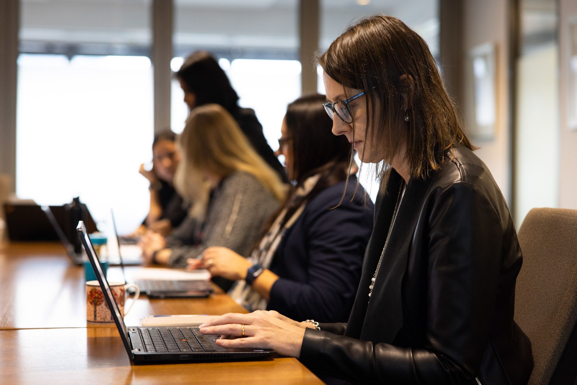 kalinda-typing-on-laptop.jpg Woman using a computer