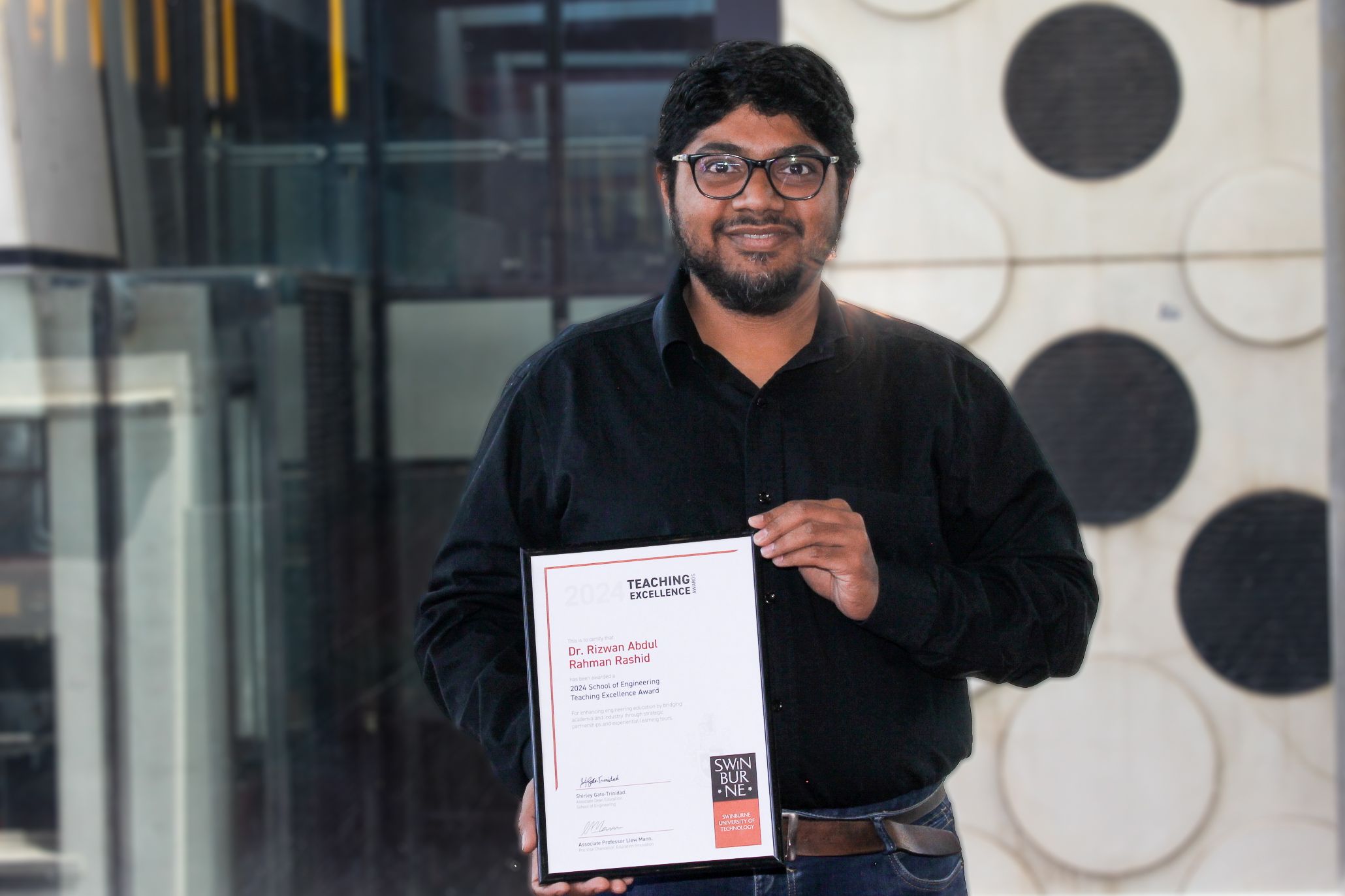 SOE School Teaching Excellence Award Recipient Dr Rizwan Abdul Rahman Rahshid School Teaching Excellence Award Recipient Dr Rizwan Abdul Rahman Rahshid holding his award.