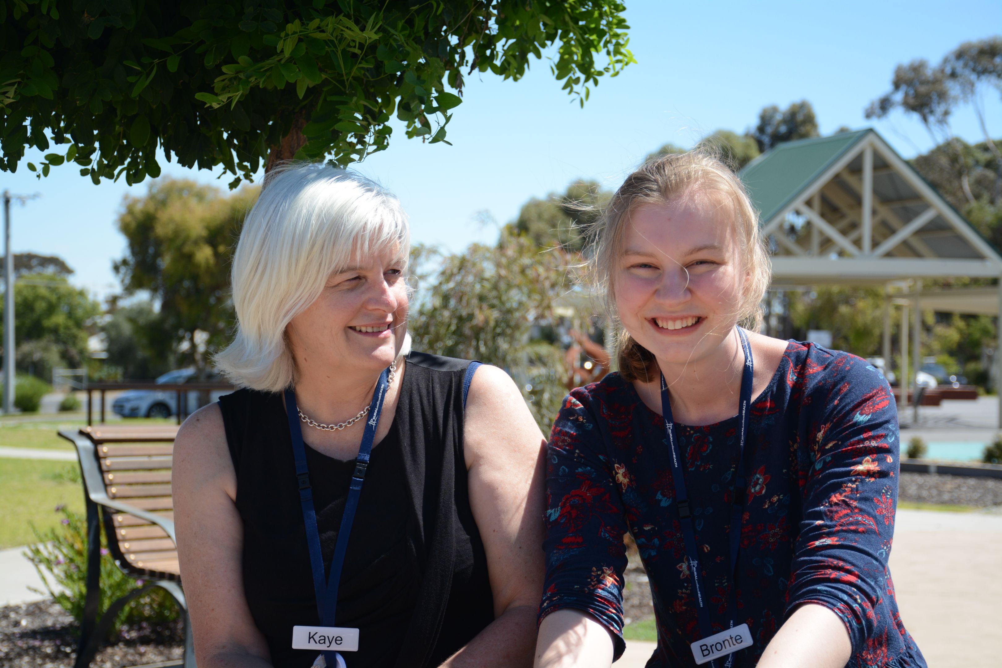 Bronte Rayner Kaye and Swinburne student, Bronte, outdoors having an informal chat.